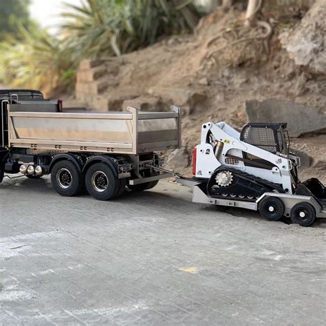 skid steer in dump trailer|14' skid steer trailer.